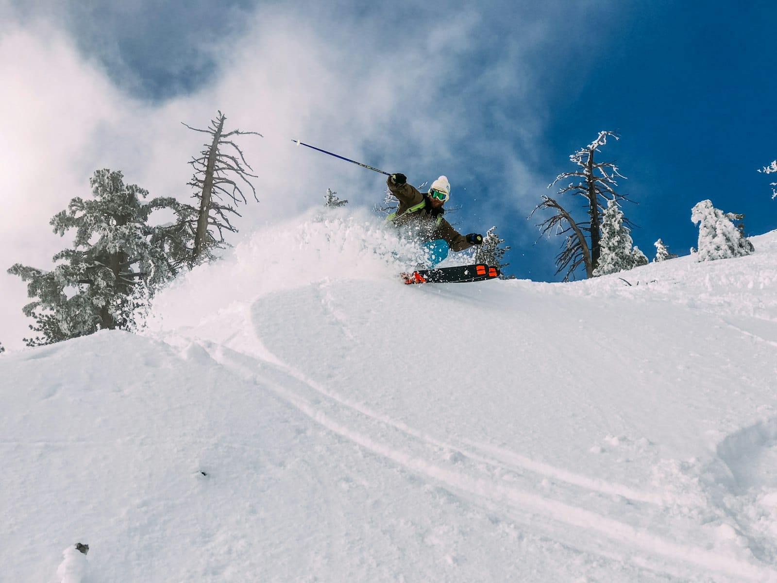 A skier on a snow-covered hill
